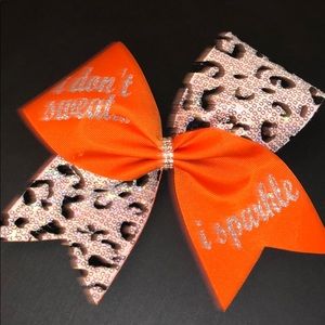 “I don’t sweat, I sparkle” cheer bow